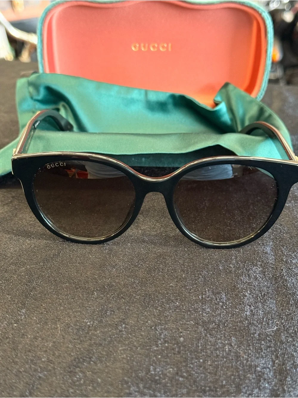 Gucci Black Round Sunglasses with Dark Lenses
